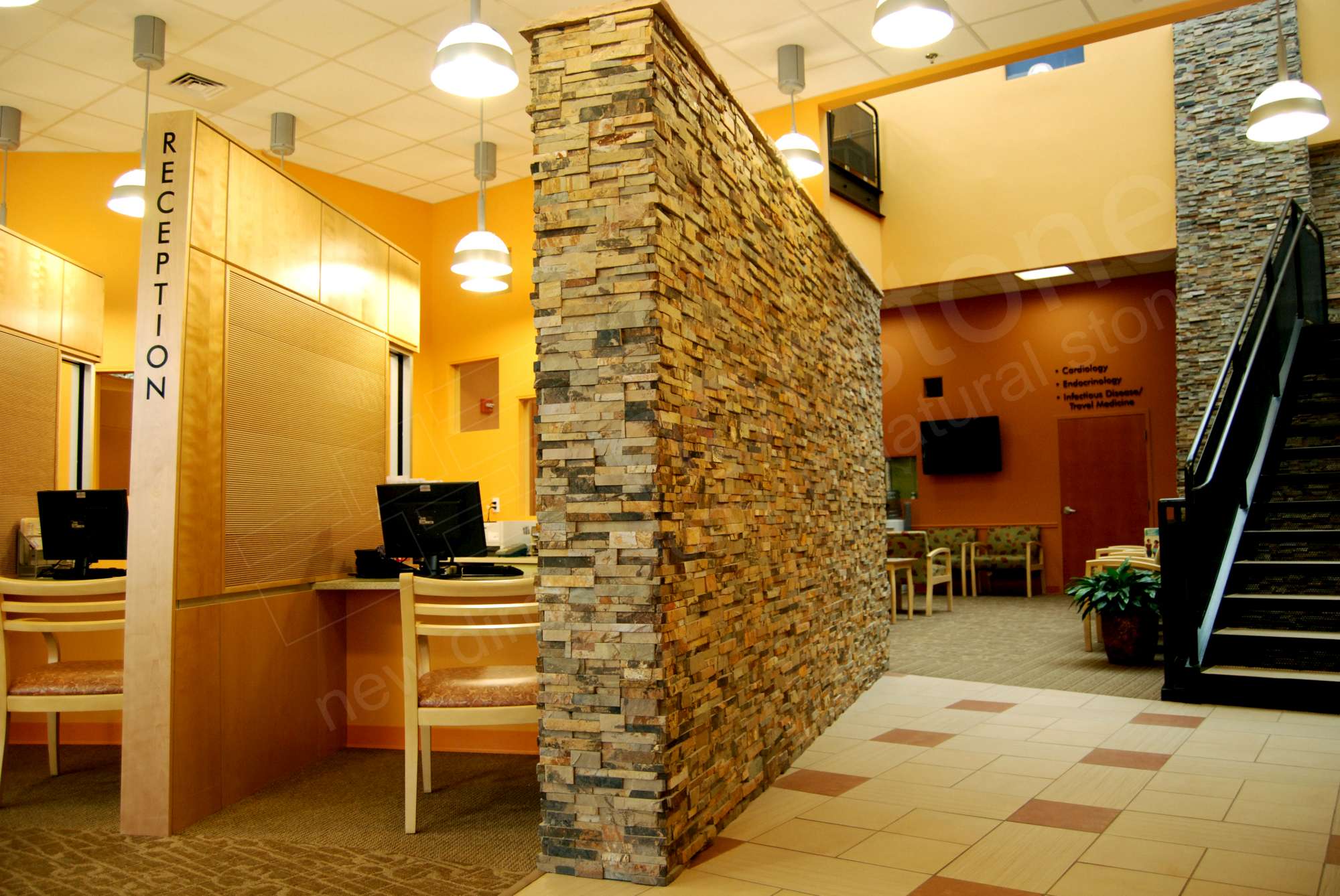 Norstone Ochre Stacked Stone Veneer Rock Panels used for dividing wall in medical office and waiting area